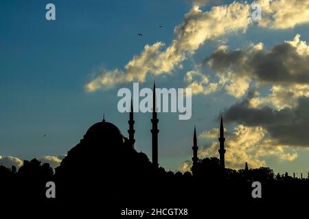 The Suleymaniye Mosque of Istanbul on blue sky in silhouette at sunset.Classical view of it.Ramadan concept. Stock Photo