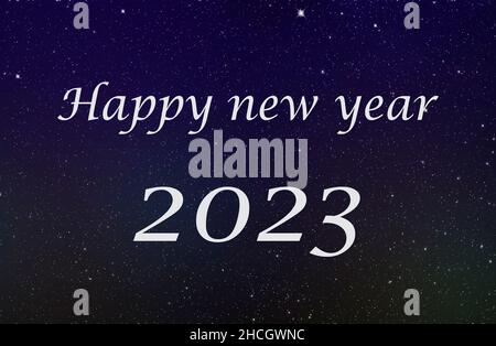 Happy new year 2023 greetings on black felt letter board on table with