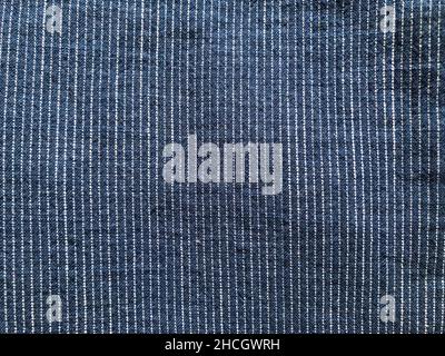 White stripes on blue fabric background Stock Photo