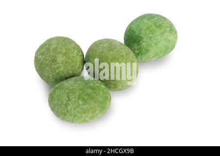 Studio shot of wasabi peanuts cut out against a white background - John Gollop Stock Photo