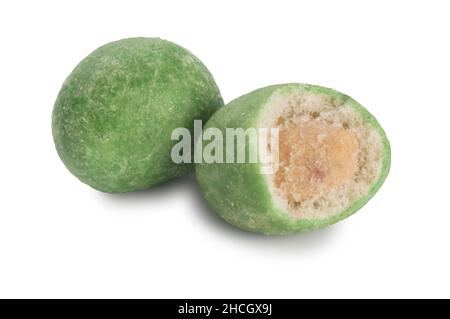 Studio shot of wasabi peanuts cut out against a white background - John Gollop Stock Photo
