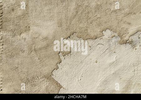 Plaster texture. Textured whitewash wall close-up with brush strokes. Stock Photo