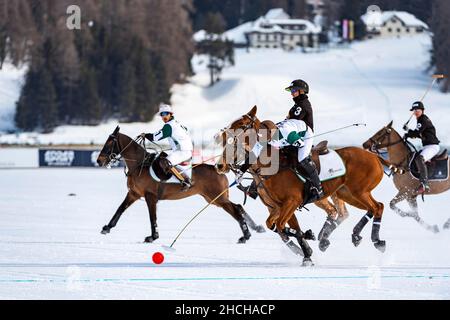 Santiago Marambio (white) from Team Azerbaijan Land of Fire and Nic Roldan (black) from Team Badrutt's Palace Hotel fight for the ball, 36th Snow Stock Photo