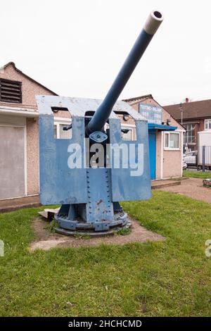 An Armstrong Whitworth, QF 12-pounder Naval Gun outside the Sea Cadets Tooting & Balham building, Mellison Road, London, SW17, England, U.K. Stock Photo