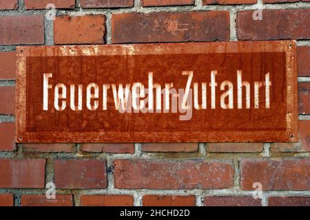 Old rusted sign for the fire brigade access road, Charlottenburg power station, Berlin, Germany Stock Photo