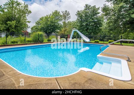 Swimming pool in a backyard of an American home Stock Photo