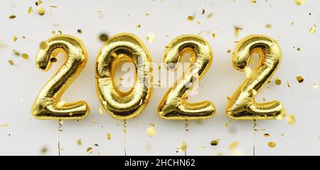 Happy New 2022 Year. 2022 golden foil balloons and falling confetti on white  background. Gold helium balloon numbers. Festive poster or banner concep Stock Photo