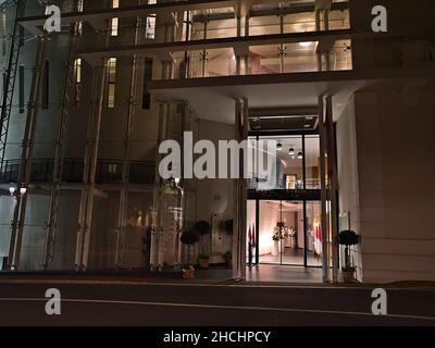 Night view of the front door of the National Council (Conseil National), legislative body of the Principality of Monaco, in the evening with lights. Stock Photo