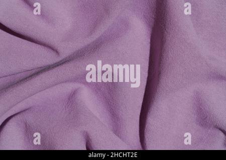 Fabric cotton background. Folds, texture and draperies on the surface textile of garment warp, upholstery and design. High quality photo Stock Photo