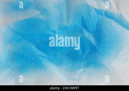 foam paper for packaging  painted with colored spray paint blue Stock Photo