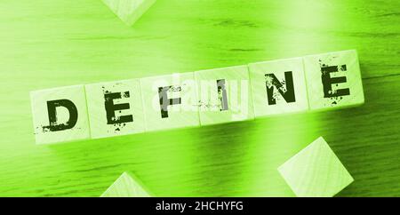 Define Word Written In Wooden Cube. Education concept. Stock Photo