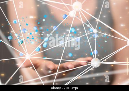 Hand behind the floating dots with connecting lines. Stock Photo