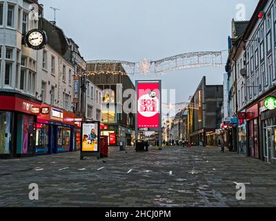 Christmas lights and shoppers on Northumberland Street, Newcastle upon Tyne, UK. Stock Photo