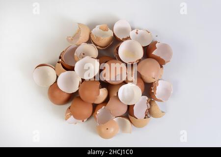 pile of eggshells on white background Stock Photo