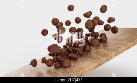 Chocolate Chips Falling Sliding on Wooden tray board Stock Photo