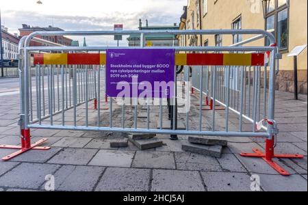 Stockholm, Sweden - May 10, 2021: Explanatory sign saying that City of Stockholm is building 8000 new parking places for bicycles between year 2019 an Stock Photo