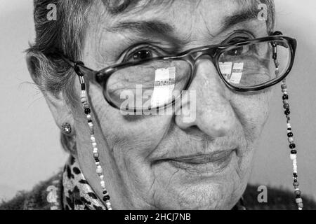 Closeup shot of a Hispanic female's eyes in grayscale Stock Photo