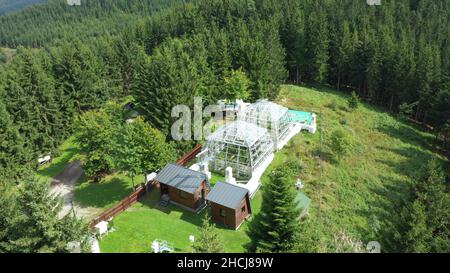 Greenhouse open top chambers climate change science research Bily Kriz, plant spruce Picea abies Norway European and mountain beech Fagus sylvatica co Stock Photo