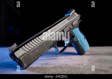 Closeup shot of a black Glock on the black background Stock Photo