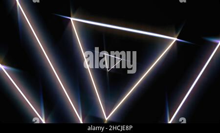 Flying through glowing rotating neon triangles in a tunnel, red pink violet spectrum, seamless loop. Fluorescent ultraviolet light of moving fast geom Stock Photo