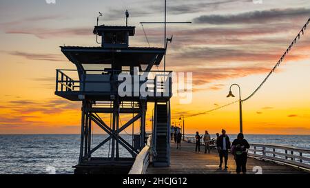 Closeup shot of the lifeguard tower for surfer at San Clemente Pier during dusk Stock Photo