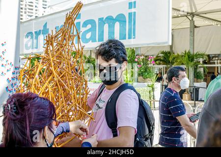 Miami Florida,Art Basel Week CONTEXT Art Miami show shows entrance,man male artwork sculpture wearing face mask getting Covid-19 vaccinated vaccinatio
