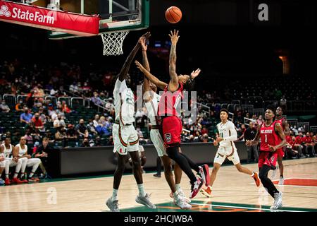 Coral Gables, Florida, USA. 29th Dec. 2021. 10 Breon Pass  during the Men’s Basketball between Miami Hurricanes vs NC State in Watsco Center. Credit: Yaroslav Sabitov/YES Market Media/Alamy Live News Stock Photo