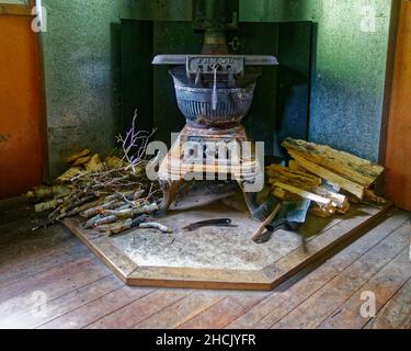 Masport Fatso pot bellied stove in a tramping hut in a national park in New Zealand. Stock Photo