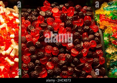 Gummies in multi colors and shapes by selling weight in a candy shop Stock Photo