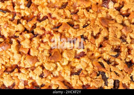 Baking plum cake in the kitchen Stock Photo