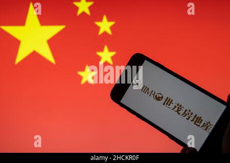 Rheinbach, Germany  29 December 2021,  The brand logo of the Chinese real estate developer 'Shimao Property Holdings' on the display of a smartphone Stock Photo