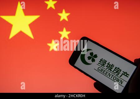 Rheinbach, Germany  29 December 2021,  The brand logo of the Chinese real estate developer 'Greentown China' on the display of a smartphone Stock Photo