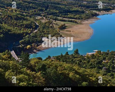 Aerial high angle view of the east of reservoir Lake of Sainte-Croix at the entrance of Verdon Gorge in Provence, France with famous road bridge. Stock Photo