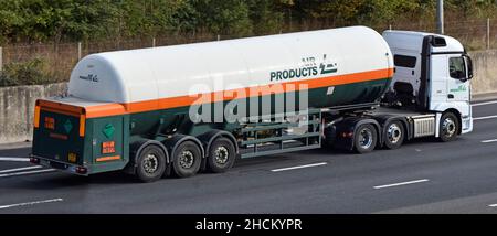 Air Products gas tanker trailer & hgv lorry truck driving along English motorway an American business selling gases & chemicals for industrial use UK Stock Photo