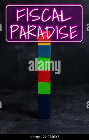 Text sign showing Fiscal Paradise. Word Written on The waste of public money is a great concern topic Stack of Sample Cube Rectangular Boxes On Stock Photo