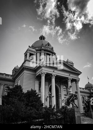 Vertical grayscale shot of the House of the National Assembly of Serbia, designed in 1901 Stock Photo