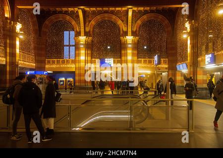 Features and architecture of Amsterdam Central Station in the evening Stock Photo