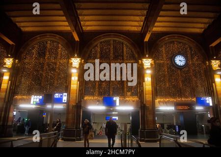 Features and architecture of Amsterdam Central Station in the evening Stock Photo