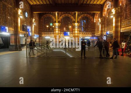 Features and architecture of Amsterdam Central Station in the evening Stock Photo