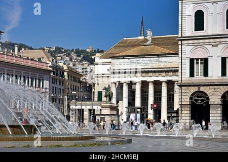 The Piazza de Ferrari Fountain in Genoa , famous fountain that is located in Genoa's main square.  Surrounded by beautiful old buildings, Italy. Stock Photo