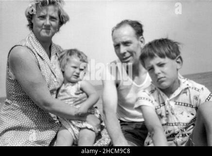 Caucasian Family of Four on their Annual Summer Holiday, Britain  1963 Stock Photo