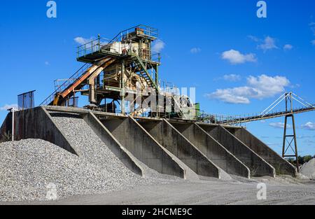 Machine on the site of a sand and gravel plant. Stock Photo