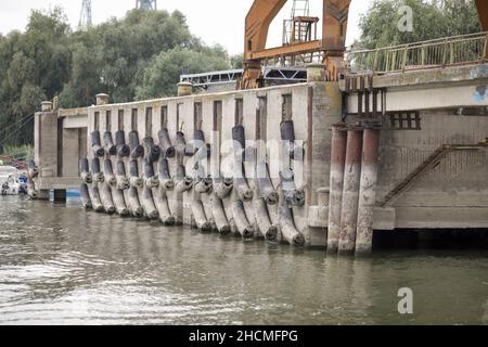 Braila, Romania - August 26, 2021: Details with concrete industrial area on the docks of Braila harbour. Stock Photo
