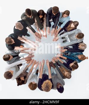 top view . a group of young people joining their palms together Stock Photo