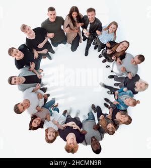 top view . happy group of young people standing in a circle Stock Photo