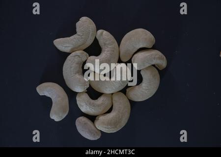 Portion of salted open pistachios on a beautiful background. High-quality background. Copy space Stock Photo