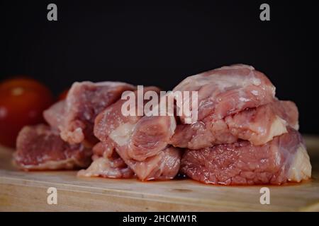 Fresh meat beef , different types of raw beef steaks  with a close-up on a wooden board Stock Photo