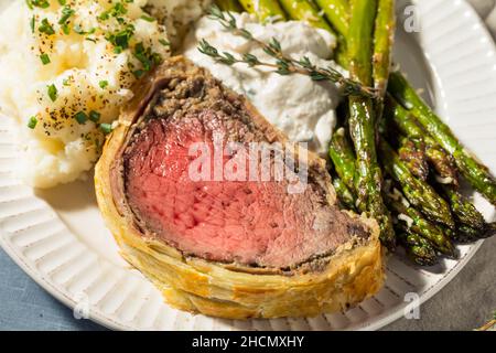 Homemade Holiday Beef Wellington Roast with Mushrooms and Puff Pastry Stock Photo