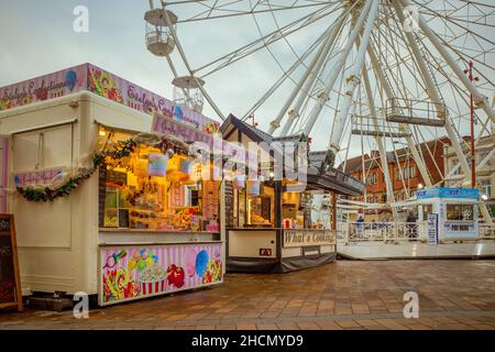 Leicester, UK, - The Christmas Wheel of Light and street food vendors make a festive appearance in Jubilee Square. Stock Photo