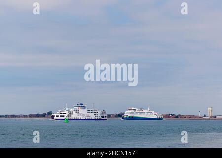 WightLink ferries going to and from Portsmouth Harbour from the Isle of Wight, Hampshire, south coast England Stock Photo